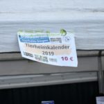Tierheim Siegen 2019 Kalenderschild am Zelt, 10 Euro.