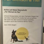 Deutsches Plakat: IKEA & Tierheim Siegen, Hund und Katze abgebildet.